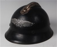 Lot 85 - A WW II German Luftscutz Civil Defence helmet,...