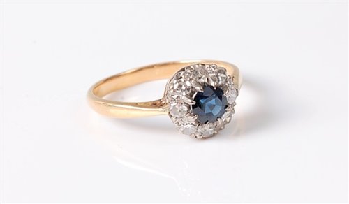 Lot 2513 - An 18ct and platinum sapphire and diamond...