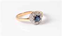 Lot 2513 - An 18ct and platinum sapphire and diamond...