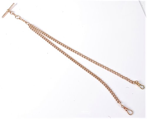 Lot 2207 - A 9ct watch chain, the curblink chain with...