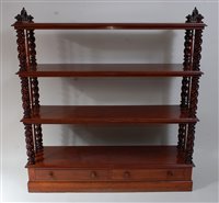 Lot 2669 - An early Victorian mahogany four-tier whatnot,...