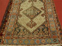 Lot 2631 - A Persian Sarab woollen runner, the ground as...