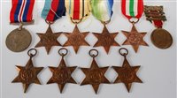 Lot 301 - A collection of nine WW II medals to include...