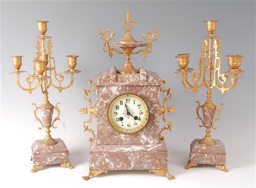 Lot 104 - A late Victorian veined rouge marble and gilt...