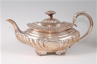 Lot 2172 - A George IV silver teapot, of half-reeded oval...