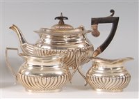Lot 2125 - A silver bachelors three-piece tea set, in the...