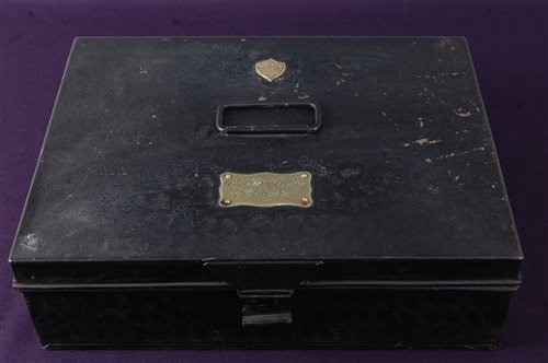 Lot 180 - A WW I period tin trunk, having a brass plaque...