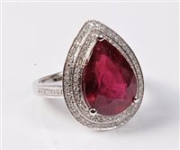 Lot 2286 - A treated ruby and diamond ring, the pear...