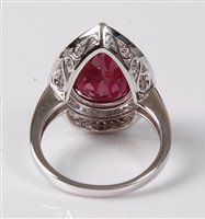 Lot 2286 - A treated ruby and diamond ring, the pear...