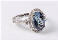 Lot 2245 - A tanzanite and diamond ring, the oval...