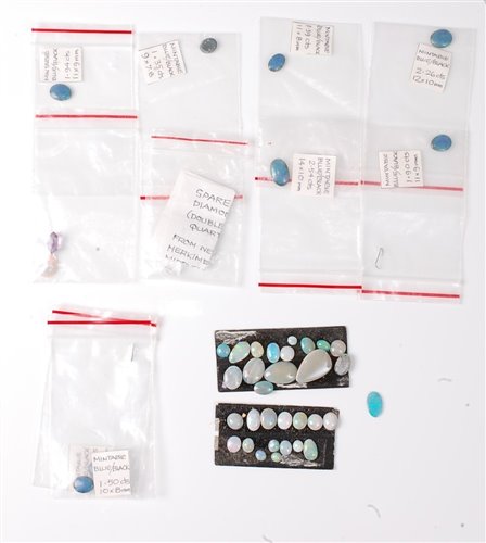 Lot 2212 - A quantity of loose opal cabochons, all of...