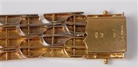 Lot 2189 - An 18ct tri-coloured gold bracelet, the...