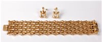 Lot 2203 - An Italian 18ct gold cuff bracelet and...