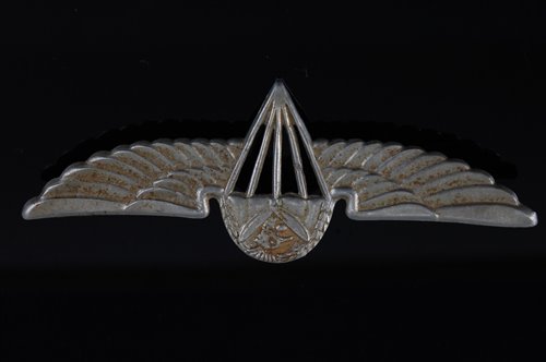 Lot 247 - A Ugandan Parachute Regiment wing badge, 9cm.