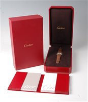 Lot 2354 - A lady's Cartier Tank Divan wristwatch, the...