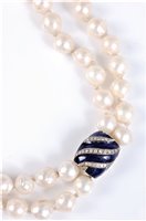 Lot 2254 - A two strand cultured pearl necklace with...