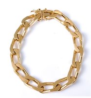 Lot 2188 - An 18ct gold curblink bracelet, the flat...