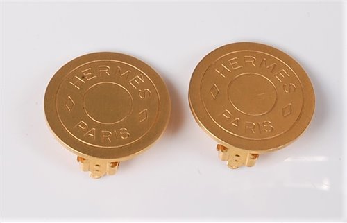 Lot 2184 - A pair of Hermes earclips, the gilt metal...