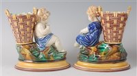 Lot 2089 - A pair of Victorian Wedgwood majolica vases,...