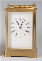 Lot 2609 - Henri Jacot of Paris - a brass carriage clock,...