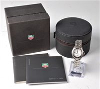 Lot 1339 - A lady's Tag Heuer Link Professional quartz...