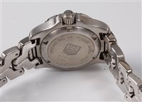 Lot 1339 - A lady's Tag Heuer Link Professional quartz...