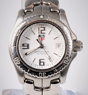 Lot 1339 - A lady's Tag Heuer Link Professional quartz...