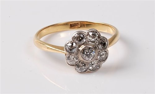 Lot 2293 - An 18ct diamond flowerhead cluster ring, the...