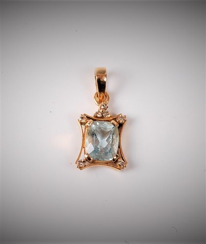 Lot 2251 - An aquamarine and diamond pendant, the mixed...