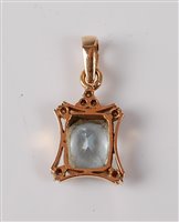 Lot 2251 - An aquamarine and diamond pendant, the mixed...