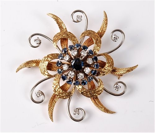 Lot 2253 - A sapphire and diamond brooch, the central...