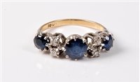 Lot 2248 - An 18ct sapphire and diamond ring, the three...