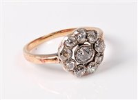 Lot 2215 - A diamond cluster ring, the central old cut...