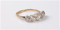 Lot 2318 - A five stone diamond ring, the five graduated...