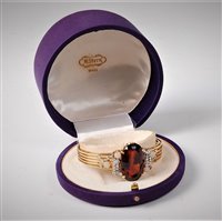 Lot 2300 - An 18ct and platinum mounted citrine, opal and...