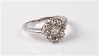 Lot 2294 - A diamond cluster ring, the central old cut...