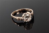 Lot 2295 - An 18ct diamond ring, the principle round...