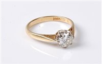 Lot 2260 - A diamond solitaire ring, the old round...
