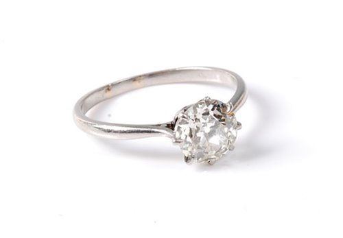 Lot 2193 - A diamond solitaire ring, the round old...