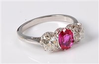 Lot 2287 - A pink sapphire and diamond ring, the oval...