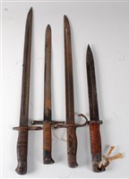Lot 187 - A collection of four bayonets to include...