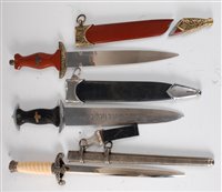 Lot 195 - A reproduction German Heer dagger, the 25.5cm...