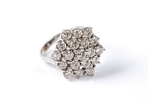 Lot 2230 - An 18ct gold diamond cluster ring, the...