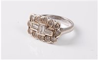 Lot 2310 - An 18ct diamond ring, the central vertical...
