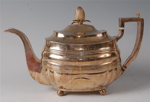 Lot 2152 - A late Georgian silver teapot, of oval bombe...