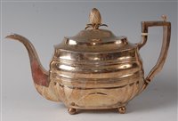 Lot 2152 - A late Georgian silver teapot, of oval bombe...