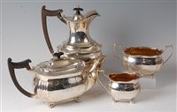 Lot 2151 - A George V silver four-piece tea and coffee...
