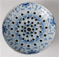 Lot 2078 - A mid-18th century English Delft colander bowl,...