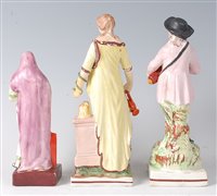 Lot 2100 - An early 19th century Staffordshire figure...