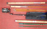 Lot 458 - A collection of eight fishing rods to include...